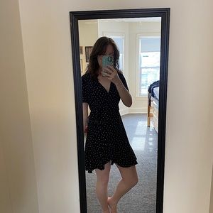 Black and white polka dot mini wrap dress